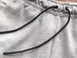 NK TECH SHORTS – GREY